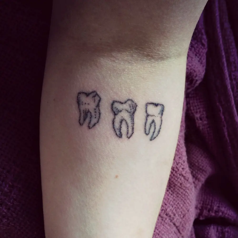 Tatuajes de dientes